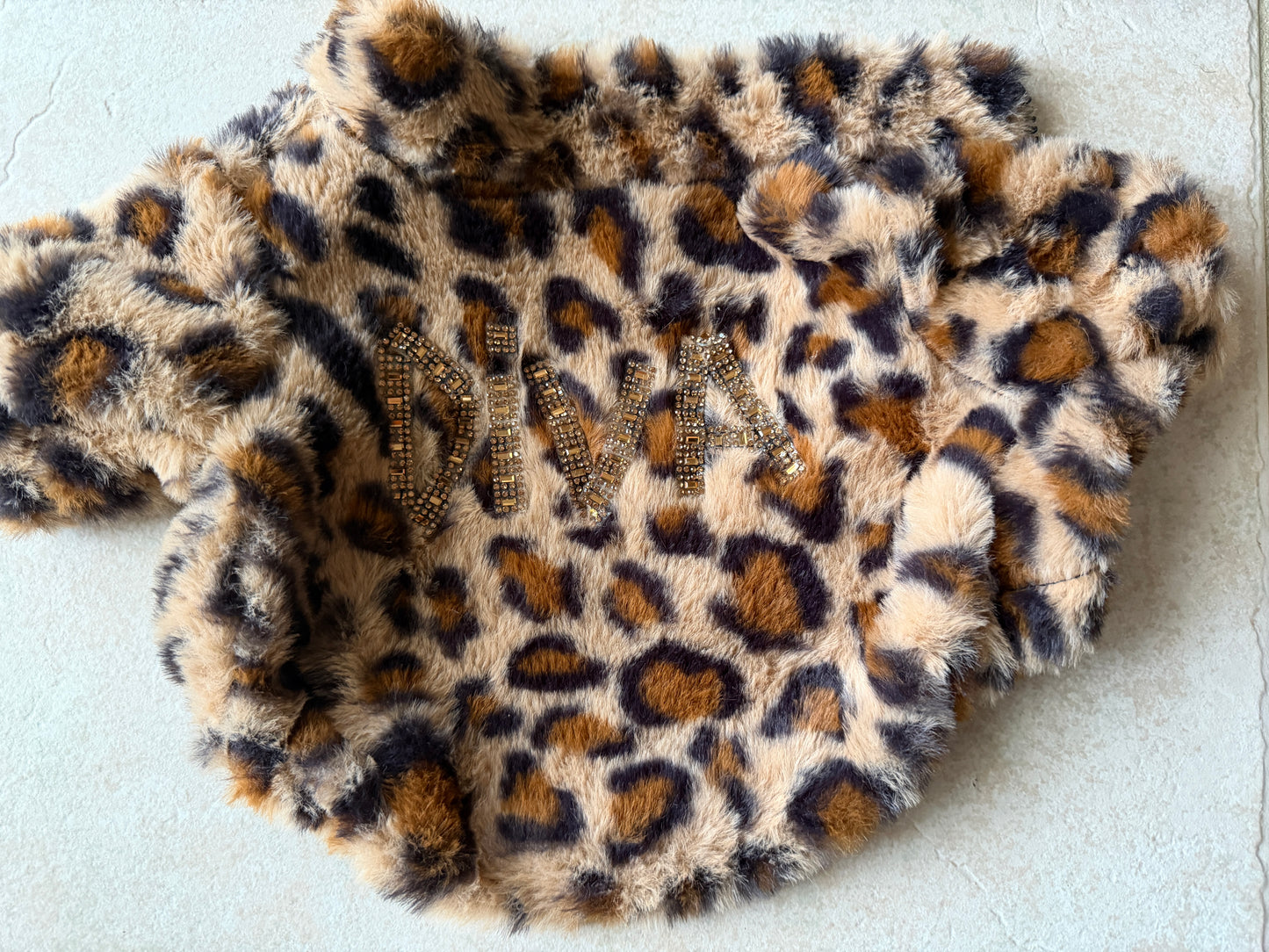 Roar with Style: Chic Animal Print Dog Jacket for Fashionistas!